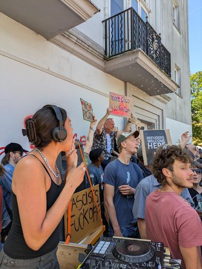 More Disco Less Fascism - sign held by DJ Fat Boy Slim