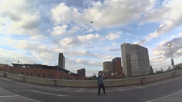 Myself on top of a multi-story carpark in Manchester with a diabolo doing some crazy air trick
